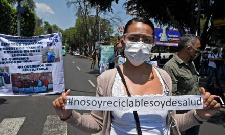 Protestan trabajadores del INER porque les piden reutilizar cubrebocas